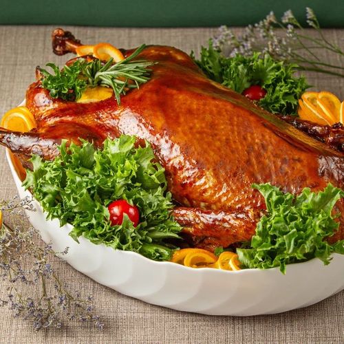 Утка с яблоками запеченная